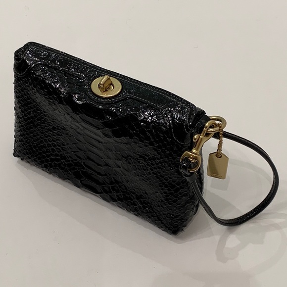 COACH black Snakeskin turn-lock clutch/wristlet 🖤